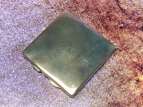 Minimalist silver tone handbag