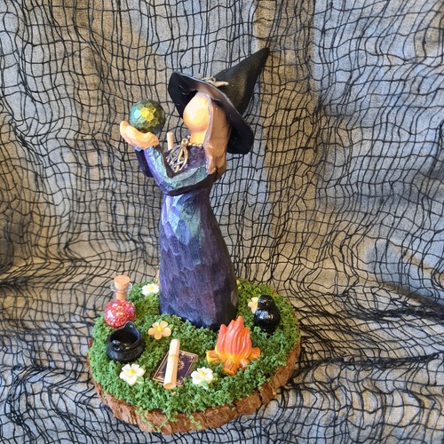 Ceramic witch holding ball - holding,