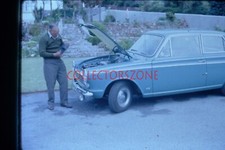 1965 35mm Slide Man checking His Ford Cortina