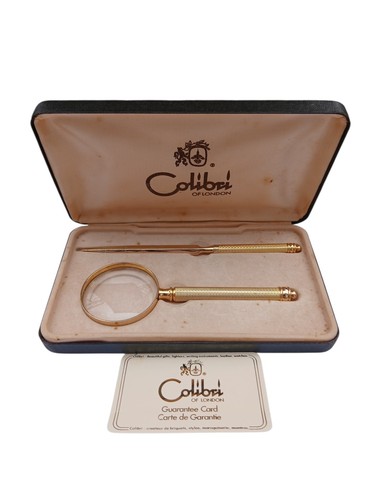 Gold magnifying glass - glass, letter