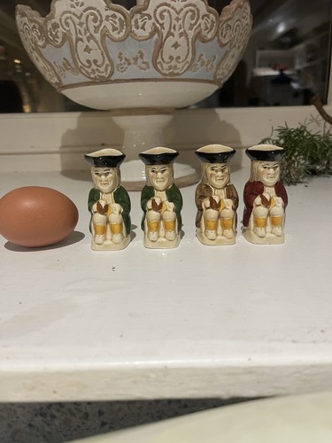Four miniature toby jugs - four,
