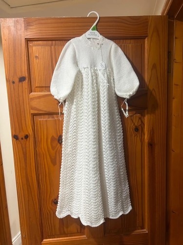 Hand knitted baby christening - hand,