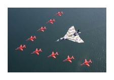 Vulcan bomber with Red Arrows