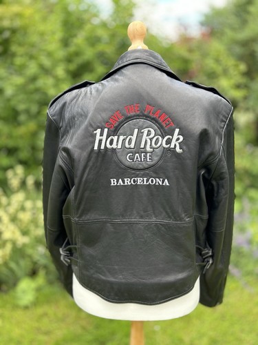 Leather jacket featuring hard - featuring,