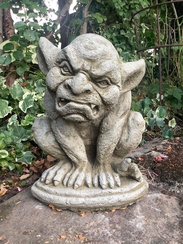 Stone garden grumpy grimacing - stone,
