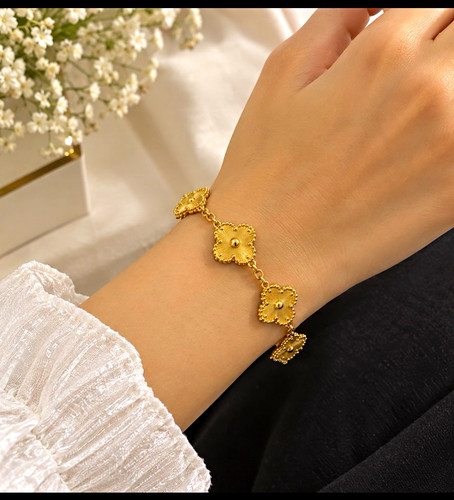 Gold tone flower charm - tone, cable
