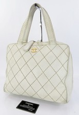 Authentic CHANEL White Wild