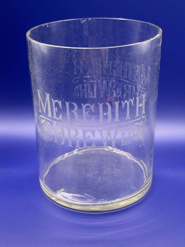 Old glass advertising biscuit