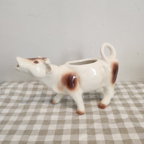 Antique west german cow milk - west,