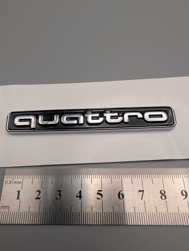 Quattro badges fits all - badges.,