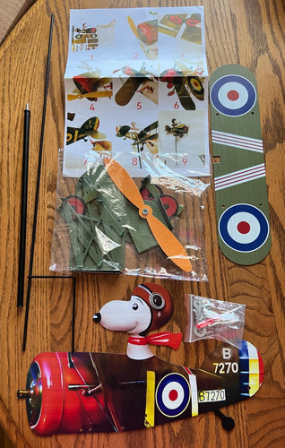 Snoopy pilot flying biplane - snoopy,