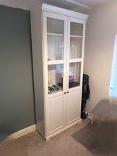 IKEA Liatorp white Bookcase with glass panel doors. Discontinued