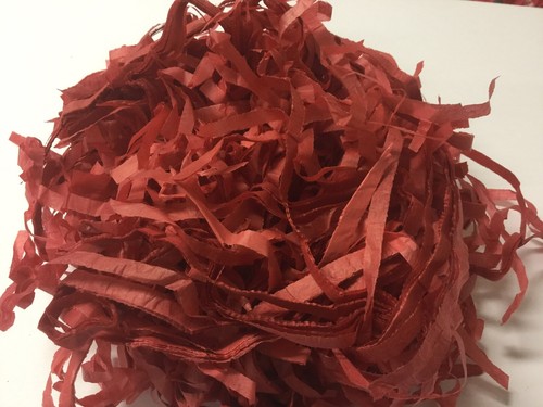 Shredded red tissue - , paper