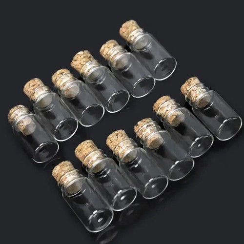 Tiny glass bottles with - x,
