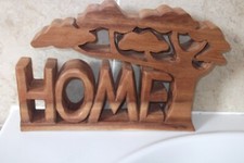 32.3CM BY 22.3CM CARVED WOODEN