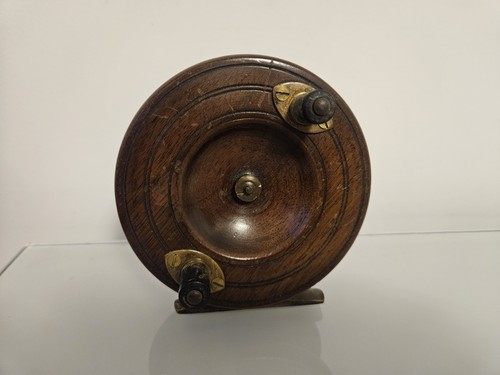 Antique wooden fishing - , reel
