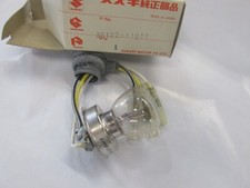 1966-1968 SUZUKI T20 TC250 T200 NOS HEADLIGHT BULB 35122-11611