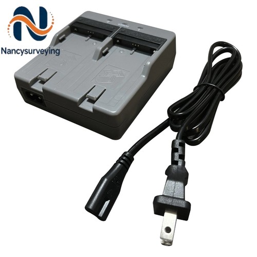 New cdc77 dual charger - new,