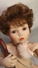Porcelain doll "Pretty as a