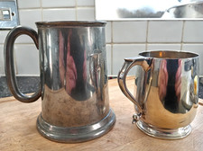 2 vintage tankards (1 pint pewter with 1961 inscription and 1 gilded half pint).