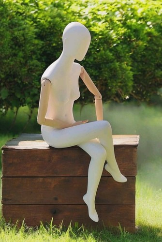 Sitting female mannequin with - female,
