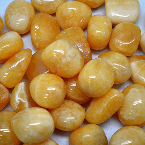 Orange calcite tumblestone - orange,