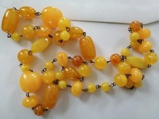 Vintage 35" bakelite necklace: butterscotch & orangey yellow flecked beads