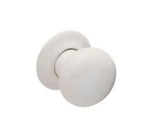 White Ceramic Door Knobs on Concealed Rose