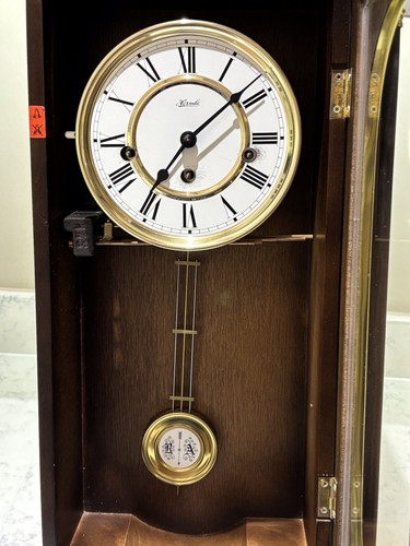 Wall clock with pendulum used - with,