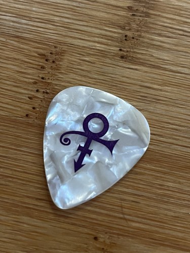 Prince rip guitar pick tour - prince,