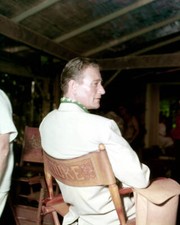 John Wayne sitting in a