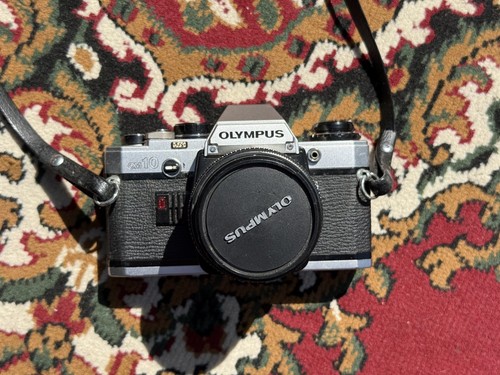 Olympus black 35mm slr - olympus,