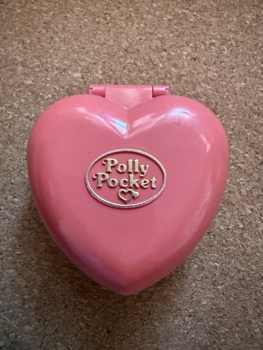 Polly pocket and her - -,
