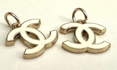 Pair chanel charms metal - chanel,