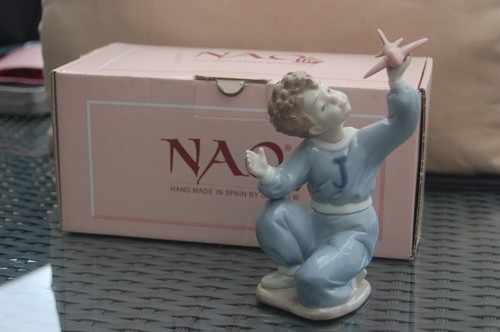 Nao figurine boy kneeling - kneeling, with
