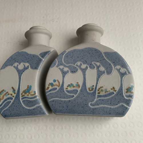 Two interlocking bottles - interlocking, with