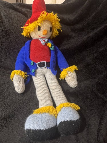 Hand knitted scare crow