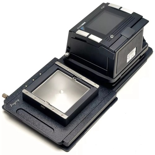 Movable adapter for linhof