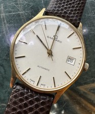 MENS GARRARD 9CT GOLD DATE AUTOMATIC WATCH IN GOOD WORKING ORDER