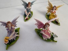 4  Flower Fairy Ornaments