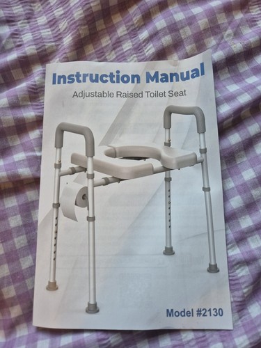 Raised toilet seat - raised,