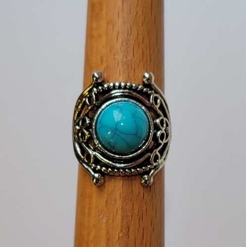 Western saddle ring with faux - ring,