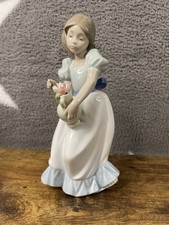 NAO Lladro Girl with vase and flowers. Handmade in Spain, height approx 8”
