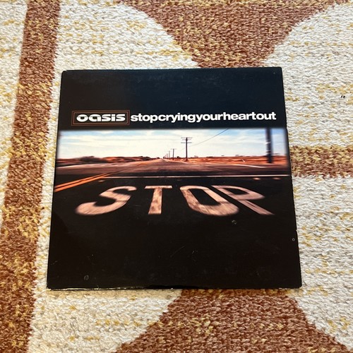 Oasis stop crying your - your, heart