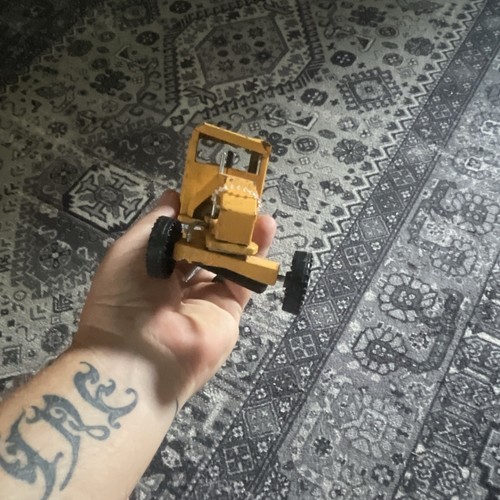 Yellow black diecast - &,