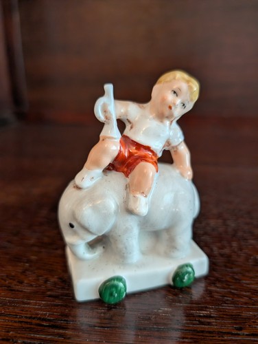 Small figurine boy with - small, of
