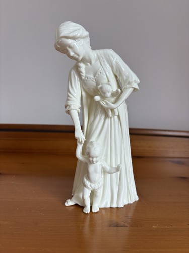 Porcelain figurine first - figurine,