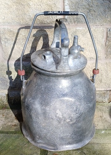 Vintage milking machine churn