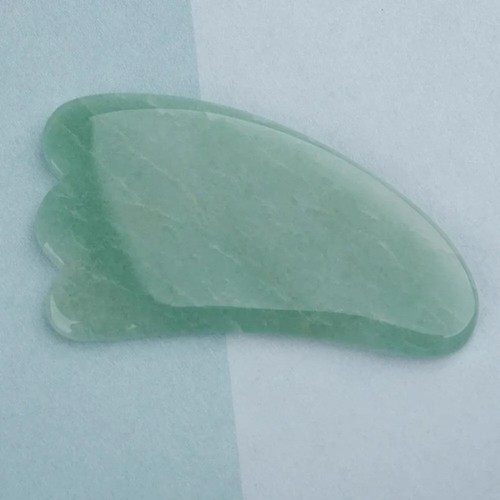 Gua sha jade stone face - stone,