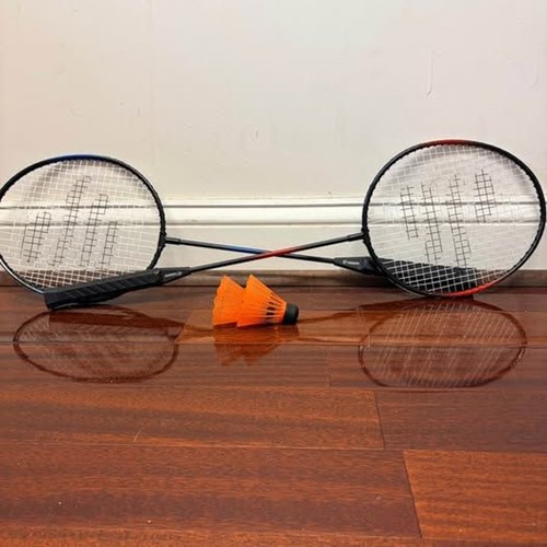 Two badminton rackets - , and